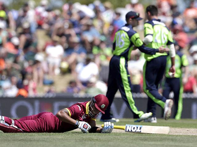 West Indies batsman Lendl Simmons makes his ground during their Cricket World Cup match against Ireland in Nelson. Reuters