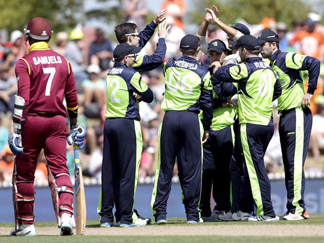 West Indies batsman Marlon Samuels (L) is out during their Cricket World Cup match against Ireland in Nelson. Reuters