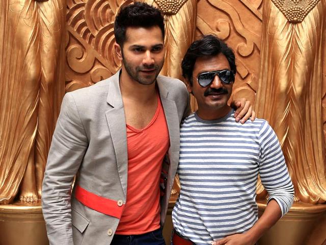 Varun Dhawan may rule the hearts of thousands of youngsters but Nawazudinn Siddiqui is no less. The duo poses during a promotional event for Badalapur in Bangalore. (AFP Photo)