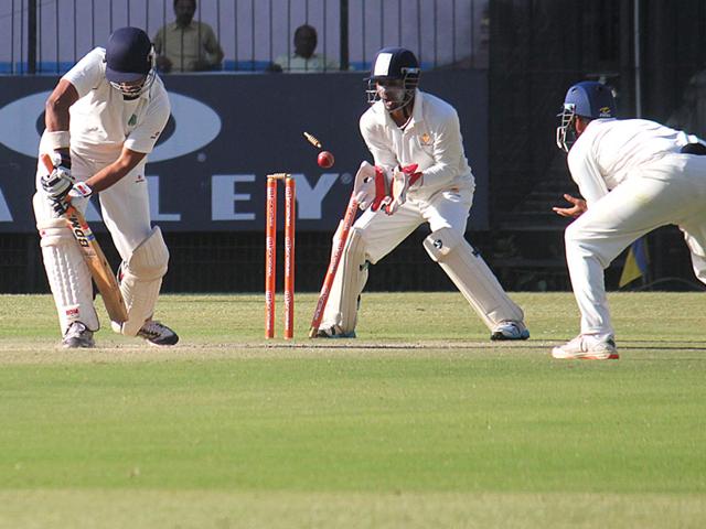 Assam batsman DS Jadhav in action on the second day of quarterfinal match between Karnataka and Assam, in Indore on Tuesday. (Shankar Mourya/HT photo)