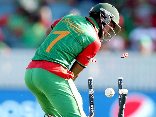 Bangladesh’s Rahaman Shabbir is bowled during their Cricket World Cup Pool A match against Afghanistan in Canberra. (AP Photo/Rob Griffith) Bangladesh’s Rahaman Shabbir is bowled during their Cricket World Cup Pool A match against Afghanistan in Canberra. (AP Photo/Rob Griffith)