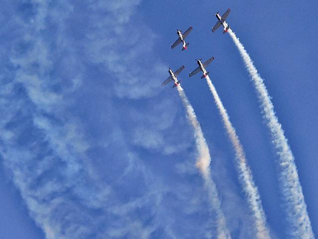 Russia's aerobatic display team "Yakovlevs" performs during the inauguration of the AERO INDIA 2015 at Yelahanka Air Base in Bengaluru on Wednesday. (PTI Photo)