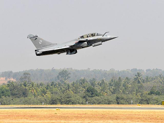 A Rafael multi-role combat aircraft from Dassault Aviation of France takes off at Yelahanka Airforce Station during the air show. (AFP Photo)