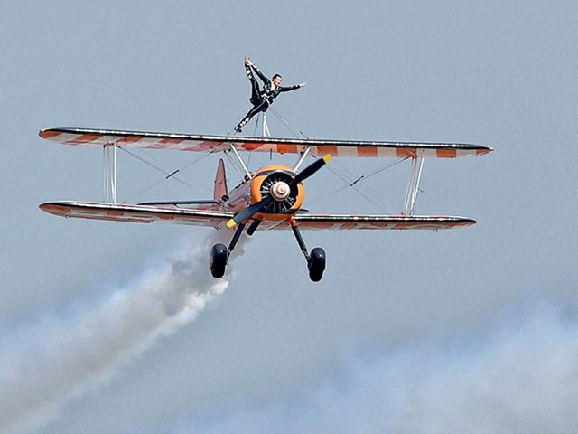 UK’s AeroSuperBatics team Breitling Wingwalkers performs during the inauguration of the Aero India 2015. (PTI Photo)