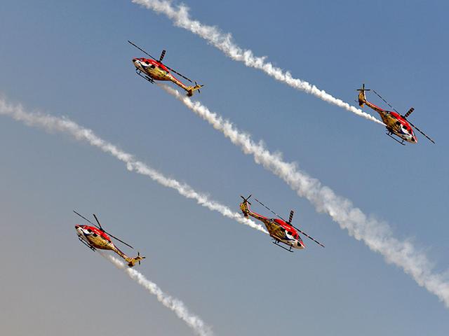 The Sarang aerobatics team of the Indian Air Force fly Advanced Light Helicopters (ALH). (AFP Photo)