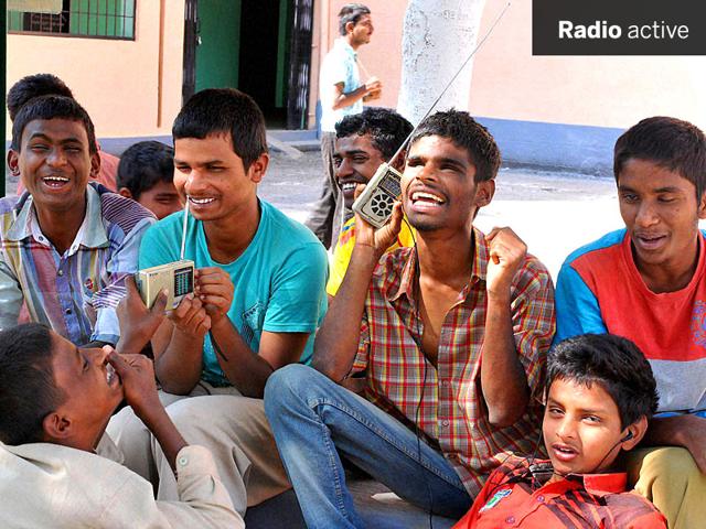 Visually impaired school children listen to commentary of India-Pakistan match on radio at Chikkamagaluru in Karnataka on Sunday. (PTI Photo)
