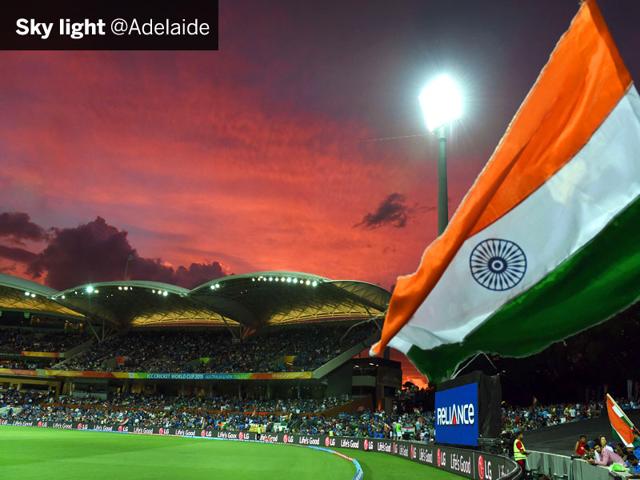 Indian fans wave the tricolour during the match against Pakistan in Adelaide on February 15. (AFP Photo)