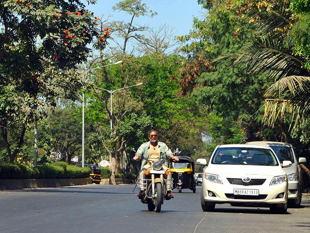 Nana Patekar rides a 'bullet' motor-cycle to promote Ab Tak Chappan 2, directed by Aejaz Gulab, in Mumbai. (AFP Photo)