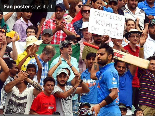 Virat Kohli (107) acknowledges the crowd as he walks back to the dressing room after his dismissal against Pakistan at the Adelaide Oval on February 15. (AFP Photo)