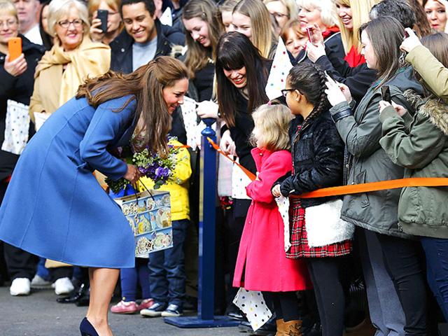 Catherine, Duchess of Cambridge greets well wishers as she leaves after a visit in Stoke-on-Trent. (Reuters) 