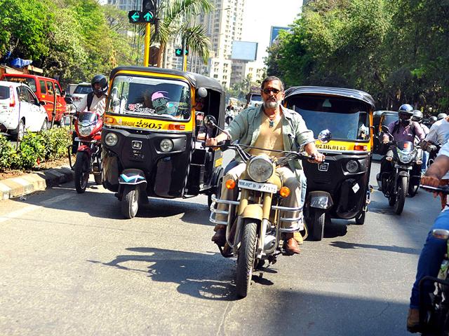 Nana Patekar takes a 'bullet-ride' for the promotions of Ab Tak Chappan 2, directed by Aejaz Gulab, in Mumbai on February 18, 2015. (AFP Photo)