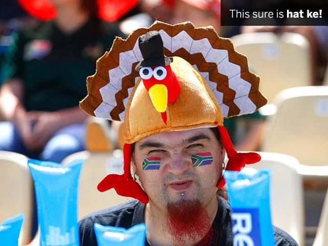 A South African fan wears a chicken hat before the start of their match against Zimbabwe in Hamilton on February 15. (Reuters Photo)