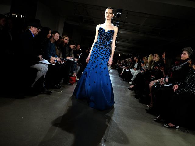 Embracing the floral trend - this black flower embroidered cobalt gown by Peter Copping for Oscar de la Renta. (AFP) Embracing the floral trend - this black flower embroidered cobalt gown by Peter Copping for Oscar de la Renta. (AFP)