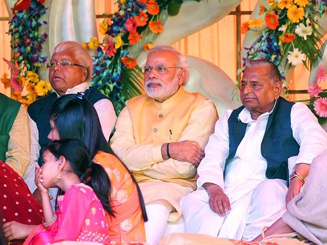 PM-Narendera-Modi-with-SP-national-president-Mulayam-Singh-Yadav-during-Mulayam-s-grand-nephew-Tej-Pratap-Singh-Yadav-s-Tilak-ceremony-in-Safai-HT-photo-Ashok-Dutta PM-Narendera-Modi-with-SP-national-president-Mulayam-Singh-Yadav-during-Mulayam-s-grand-nephew-Tej-Pratap-Singh-Yadav-s-Tilak-ceremony-in-Safai-HT-photo-Ashok-Dutta