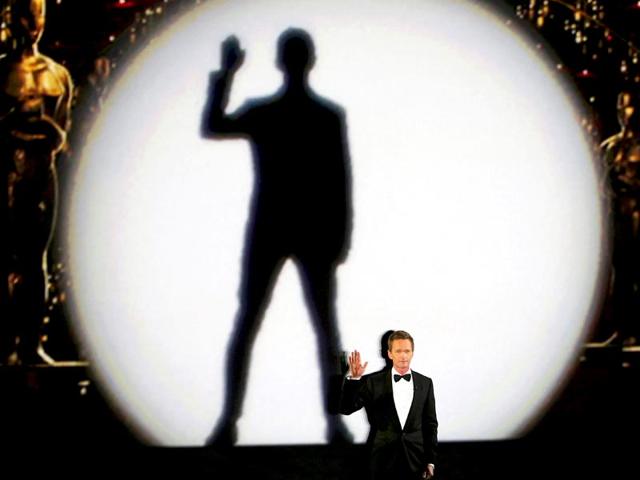Neil Patrick Harris paid musical tribute to the 'moving pictures' in his opening number. (Photo: AFP)