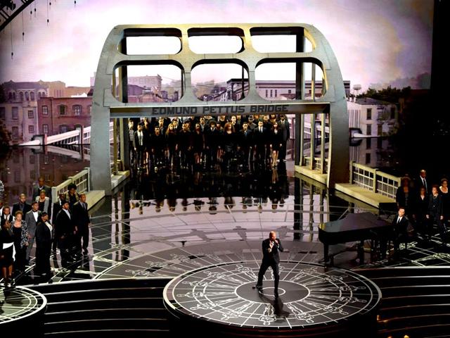 John Legend and Common left the crowd in tears and earned the first standing ovation of the night for their gut-wrenching performance of their Oscar winning song, Glory from Selma. (Photo: AP)
