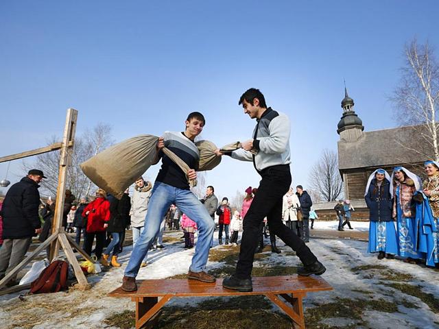 Young men fight with hay stuffed bags during festivities to mark Maslenitsa celebrations, or Shrovetide, in the village of Ozertso, in outskirts of Minsk, Belarus. (AP photo)