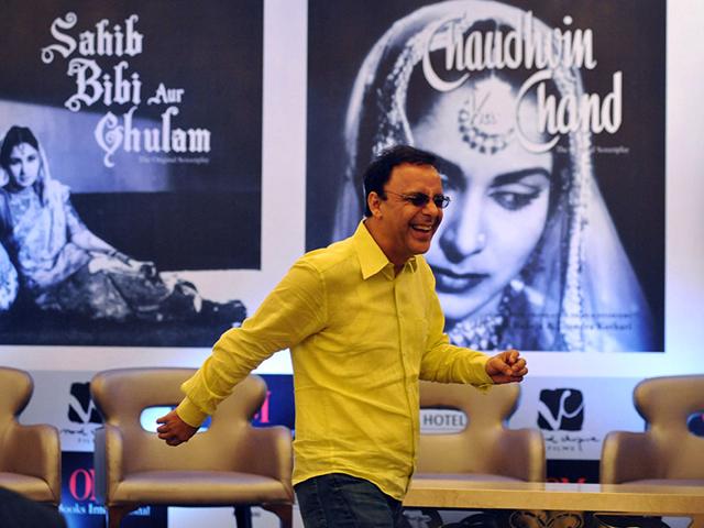 Vidhu Vinod Chopra is just too happy at the launch a set of three Hindi screenplays in Mumbai on February 23, 2015. (AFP Photo)