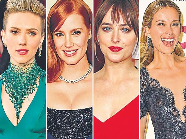 Neck deep in style: Actor Scarlett Johansson’s dramatic neck adornment, and actor Jessica Chastain’s beaded bodice gave a playful spin to their glam gowns. Actor Dakota Johnson’s red Saint Laurent gown had a quirky knotted diamond strap, while model Petra Nemcova’s cut-out lace neck also made for head turning style. Neck deep in style: Actor Scarlett Johansson’s dramatic neck adornment, and actor Jessica Chastain’s beaded bodice gave a playful spin to their glam gowns. Actor Dakota Johnson’s red Saint Laurent gown had a quirky knotted diamond strap, while model Petra Nemcova’s cut-out lace neck also made for head turning style.