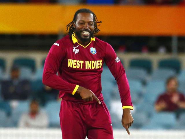 West Indies' Chris Gayle celebrates the wicket of Zimbabwe's Stuart Matsikenyeri during their 2015 Cricket World Cup match at Manuka Oval in Canberra. (Reuters Photo)