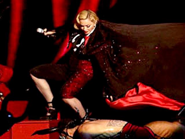 US-pop-star-Madonna-fell-from-the-podium-during-her-performance-at-the-Brit-Awards-YouTube-grab