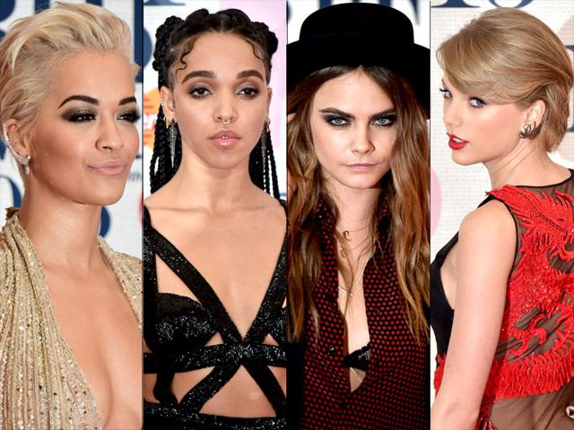 L-R: Singers Rita Ora, Tahliah Debrett Barnett alias FKA twigs, model Cara Delevingne and singer Taylor Swift pose at BRIT Awards red carpet. (AFP)