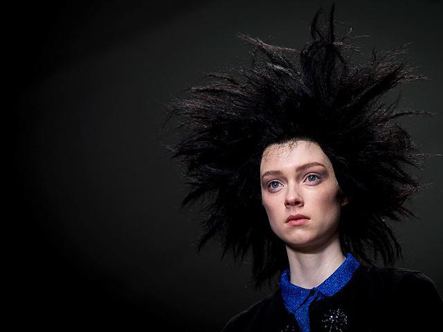 Sibling: Bold wigs brought morning-after hair to mind at Sibling, where make-up was kept natural, with strong brows, matte eye shadow and bee-stung lips. Sibling: Bold wigs brought morning-after hair to mind at Sibling, where make-up was kept natural, with strong brows, matte eye shadow and bee-stung lips.