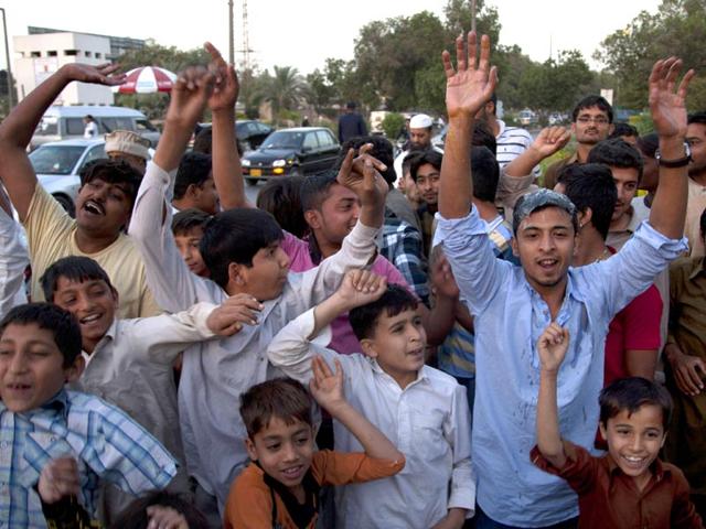 Pakistani-cricket-fans-chant-slogans-to-protest-against-the-country-s-chief-cricket-selector-Moin-Khan-at-Karachi-airport-Thursday-Feb-26-2015-Khan-returned-home-on-the-orders-of-Pakistan-Cricket-Board-chairman-Shaharyar-Khan-for-dining-out-in-a-casino-during-World-Cup-in-Christchurch-New-Zealand-last-week-AP-Photo-Shakil-Adil Pakistani-cricket-fans-chant-slogans-to-protest-against-the-country-s-chief-cricket-selector-Moin-Khan-at-Karachi-airport-Thursday-Feb-26-2015-Khan-returned-home-on-the-orders-of-Pakistan-Cricket-Board-chairman-Shaharyar-Khan-for-dining-out-in-a-casino-during-World-Cup-in-Christchurch-New-Zealand-last-week-AP-Photo-Shakil-Adil