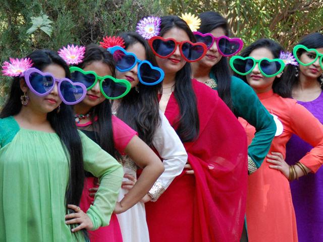 Girls participate in fancy dress competition at Nutan College in Bhopal on Thursday. (PTI photo)