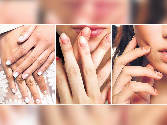 (L): Using mint-hued nail enamel, the spring-summer showcase for designer Charlotte Ronson gave a minimal chic twist to the good old French manicure. (C): The peach, reverse moon-shaped negative space manicure rocked the ramp at the Delpozo spring presentation at the Fashion Week. (R): The negative space in between dual-toned nail enamel amped the nail game at the Creatures Of Comfort spring-summer presentation. (L): Using mint-hued nail enamel, the spring-summer showcase for designer Charlotte Ronson gave a minimal chic twist to the good old French manicure. (C): The peach, reverse moon-shaped negative space manicure rocked the ramp at the Delpozo spring presentation at the Fashion Week. (R): The negative space in between dual-toned nail enamel amped the nail game at the Creatures Of Comfort spring-summer presentation.