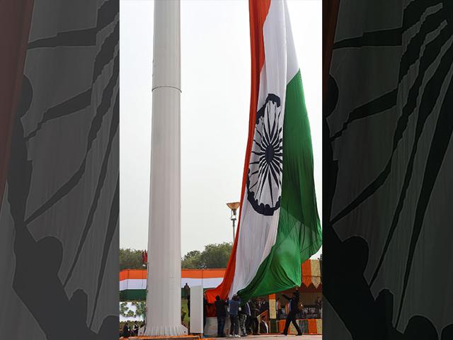 The tricolour being unfurled in Faridabad. (AFP Photo)