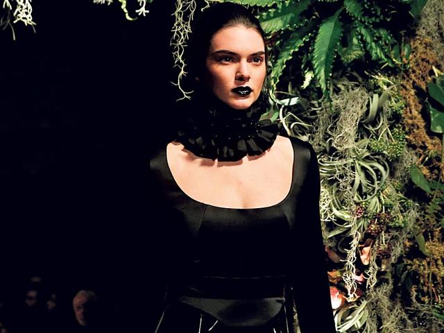 Glossy black lips look stood out at designer Giles Deacon’s showcase at the London Fashion Week. Glossy black lips look stood out at designer Giles Deacon’s showcase at the London Fashion Week.