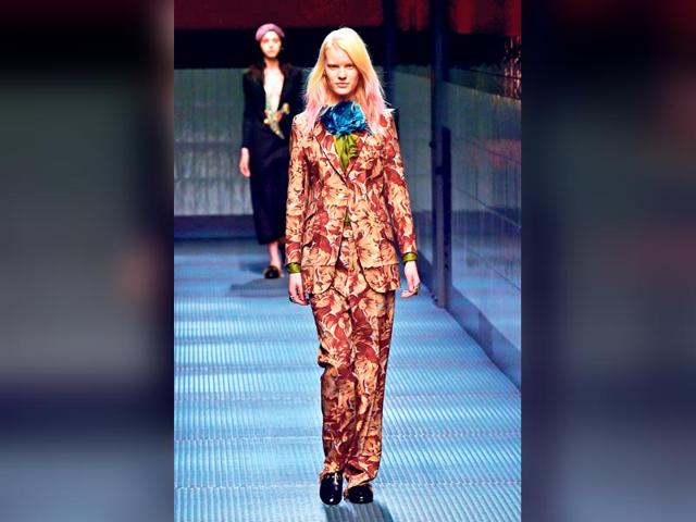 Models sported dip-dyed, bubblegum pink hair at the Gucci showcase at the Milan Fashion Week. Models sported dip-dyed, bubblegum pink hair at the Gucci showcase at the Milan Fashion Week.