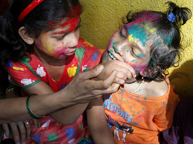 Disabled children celebrated Holi, the festival of colours at the Society for the Education of the Crippled in Agripada, Mumbai. (Vijayanand Gupta/HT photo)