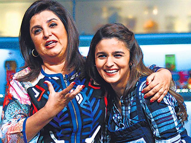 Caught between Farah and food: Alia Bhatt on the sets of Happy New Year director's show Farah ki Daawat. (HT photo)