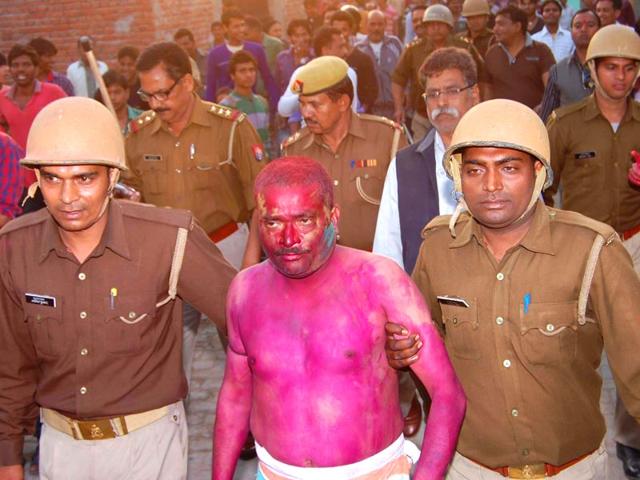 Cops-take-away-the-manager-of-the-school-where-the-Holi-party-was-organised-HT-Photo