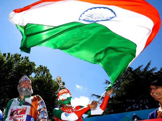 Indian cricket fan Sudhir Gautam gets ready for the Cricket World Cup match between India and Ireland in Hamilton. REUTERS