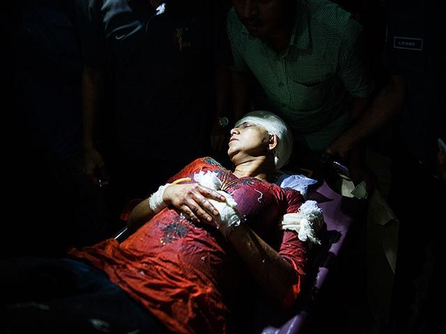 Slain-US-Bangladeshi-blogger-Avijit-Roy-s-wife-Rafida-Ahmed-Banna-is-carried-on-a-stretcher-after-she-was-seriously-injured-by-unidentified-assailants-at-Dhaka-Medical-Collage-hospital-in-Dhaka-on-February-27-2015-AFP-Photo Slain-US-Bangladeshi-blogger-Avijit-Roy-s-wife-Rafida-Ahmed-Banna-is-carried-on-a-stretcher-after-she-was-seriously-injured-by-unidentified-assailants-at-Dhaka-Medical-Collage-hospital-in-Dhaka-on-February-27-2015-AFP-Photo