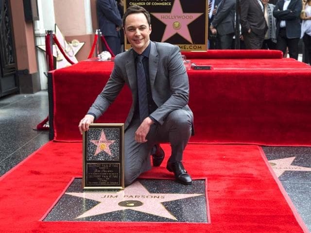 Jim-Parsons-poses-on-his-star-after-it-was-unveiled-on-the-Hollywood-Walk-of-Fame-in-Los-Angeles-California--Photo-Reuters