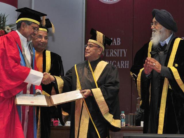 Nobel Peace Prize Laureate Kailash Satyarthi receiving the honorary degrees from President of India Pranab Mukherjee during the Sixty Fourth Convocation of Panjab University in Chandigarh on Saturday. Gurpreet Singh/HT