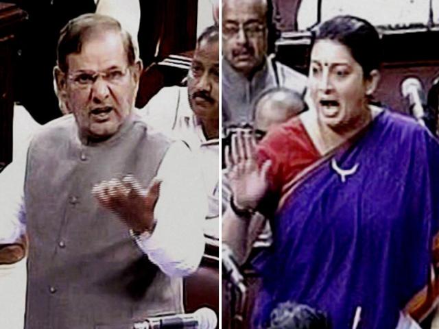 JD-U-leader-Sharad-Yadav-and-HRD-minister-Smriti-Irani-in-Rajya-Sabha-in-New-Delhi-PTI-Photos JD-U-leader-Sharad-Yadav-and-HRD-minister-Smriti-Irani-in-Rajya-Sabha-in-New-Delhi-PTI-Photos