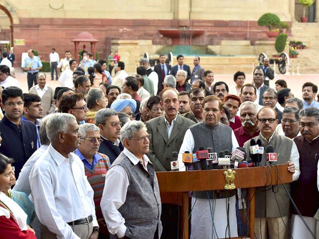 JD-U president Sharad Yadav with Congress President Sonia Gandhi, former PM Manmohan Singh and a delegation of Opposition parties' leaders, addresses the media after meeting President Pranab Mukherjee over the controversial Land Acquisition Bill, at Rashtrapati Bhavan in New Delhi . (PTI photo)