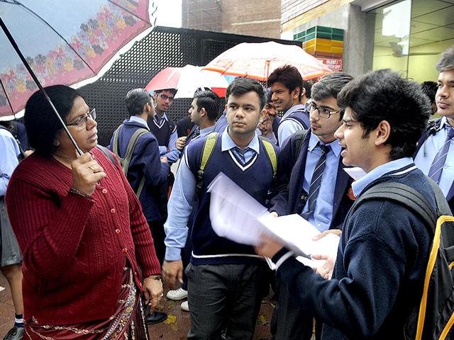 Class-XII-students-discuss-doubts-with-a-teacher-before-their-exam-in-New-Delhi-Sushil-Kumar-HT-Photo