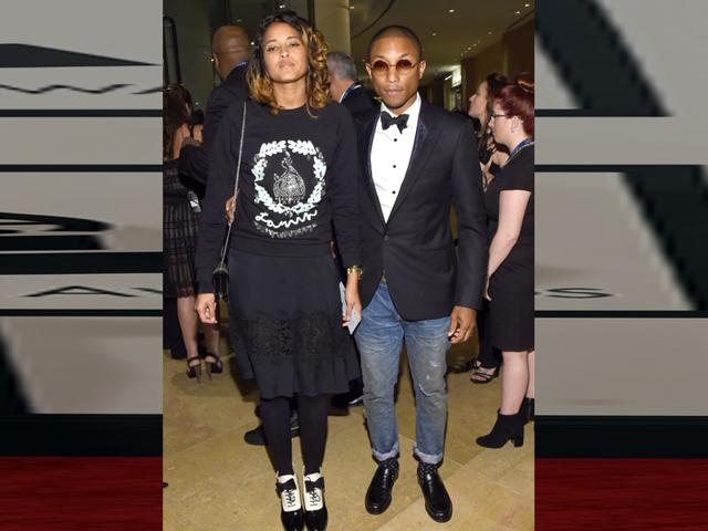 Pharrell Williams in a semi-formal avatar. We love how he accessorized his look with those Lennon glasses.