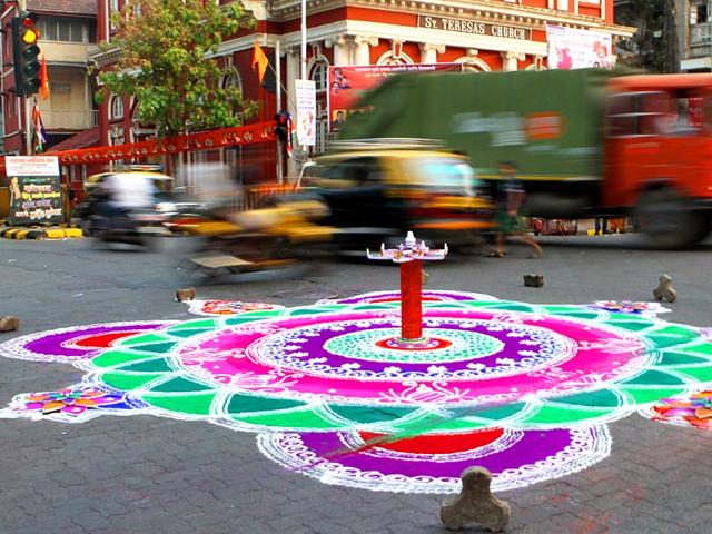 A huge rangoli in the middle of the road near St. Teresa Church as Maharashtrian celebrate Gudi Padwa - New Year at Charni Road in Mumbai. (Arijit Sen/HT Photo)