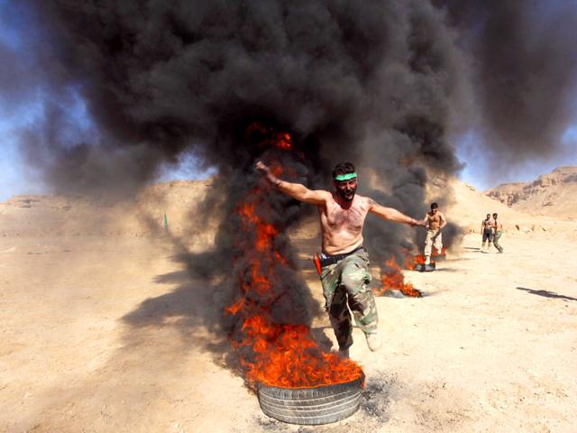 Thousands-of-Shiites-have-volunteered-to-join-the-Iraqi-Army-to-fight-the-Islamic-State-militants-who-have-captured-large-swathes-of-territory-in-the-north-of-the-country-Reuters-Photo Thousands-of-Shiites-have-volunteered-to-join-the-Iraqi-Army-to-fight-the-Islamic-State-militants-who-have-captured-large-swathes-of-territory-in-the-north-of-the-country-Reuters-Photo