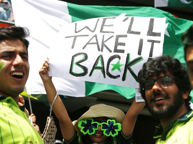 Fans of Pakistan's cricket team cheer in the stands before Pakistan's Cricket World Cup match against India in Adelaide, February 15, 2015. REUTERS