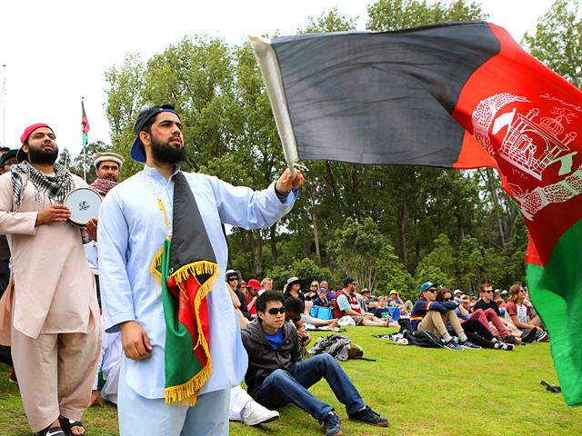 Afghanistan supporters cheer on their team during their Cricket World Cup match against Sri Lanka in Dunedin, New Zealand, Sunday, Feb. 22, 2015. (AP Photo