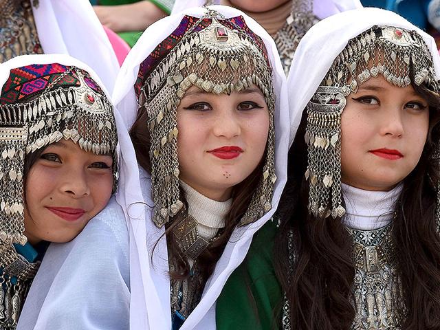 Girls gather during a rehearsal for the Pakistan Day celebrations in Quetta. (AFP Photo)