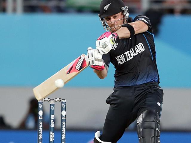 New-Zealand-s-captain-Brendon-McCullum-L-hands-the-ball-to-bowler-Tim-Southee-during-the-Cricket-World-Cup-final-match-against-Australia-at-the-Melbourne-Cricket-Ground-MCG-Reuters